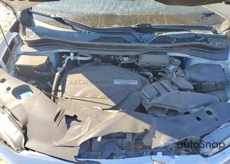 2020 Honda Pilot Touring z USA, uszkodzony, nr VIN 5FNYF5H95LB008182